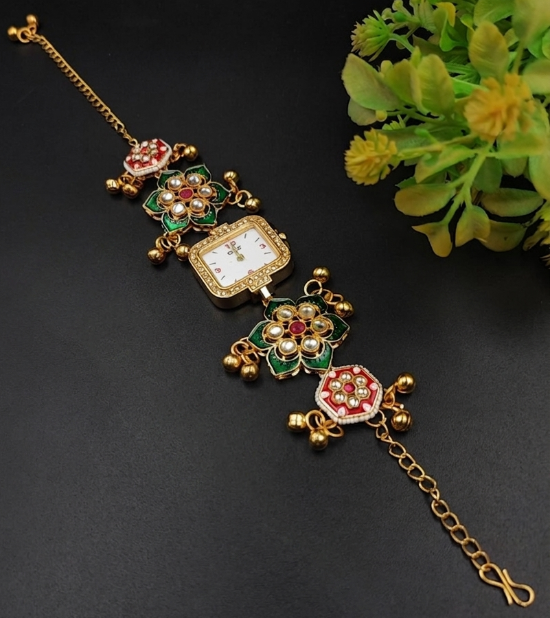 Gold plated Kashmiri bracelet watch with Meenakari enamel in green red, white kundan stones, hexagonal floral links, ghungroo