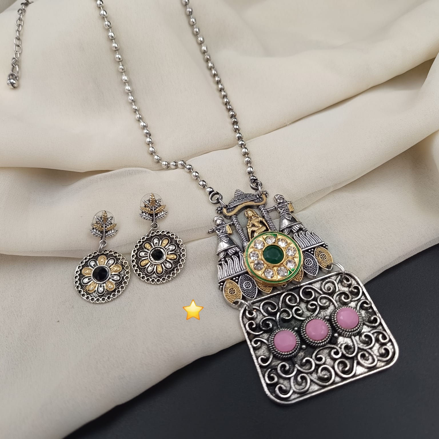 Handcrafted antique silver bead necklace set paired with matching statement drop earrings.