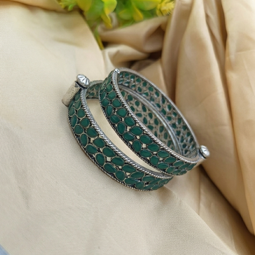 Thumbnail: Oxidised silver stone-set openable kada bangle with jali work, ruby red and emerald green stones, ethnic Indian jewellery