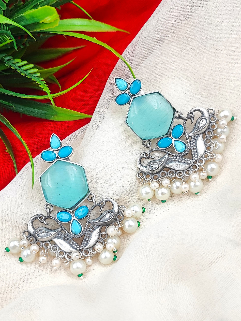 Thumbnail: Silver lookalike Monalisa stone demanding Earrings