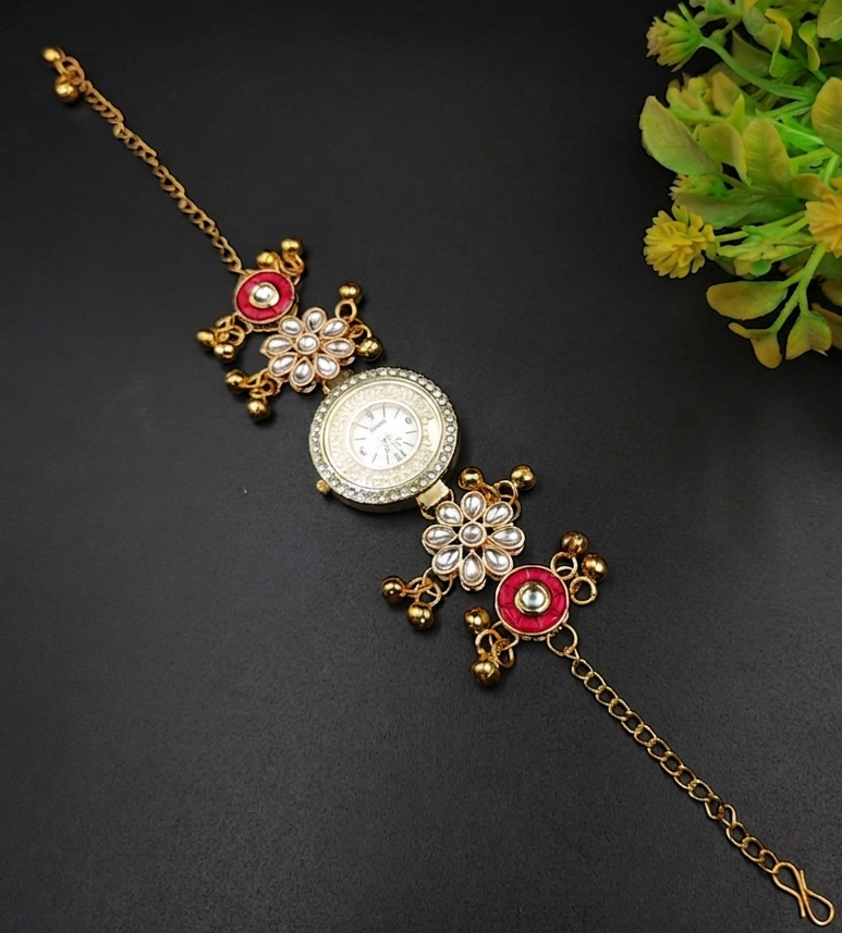 Gold plated Kashmiri bracelet watch with pink and white teardrop stones in floral design with ghungroo bells