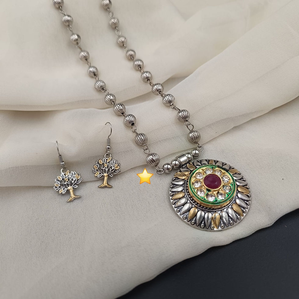 Unique statement necklace set featuring detailed traditional oxidized metalwork and matching statement earrings