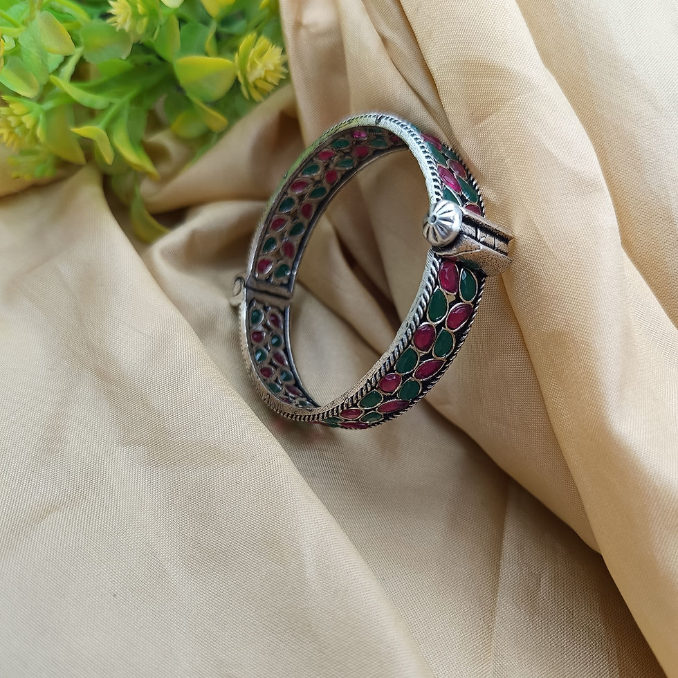 Oxidised silver stone-set openable kada bangle with jali work, ruby red and emerald green stones, ethnic Indian jewellery
