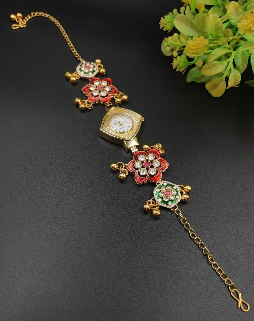 Gold plated Kashmiri bracelet watch with red and green artificial stones in floral hexagonal design with ghungroo bells
