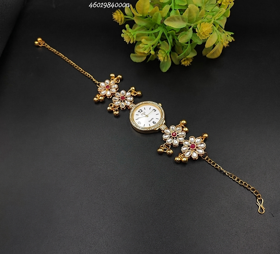 Gold plated Kashmiri bracelet watch with eight-petaled floral charms, clear crystal stones, ruby red centers, and dangling gh