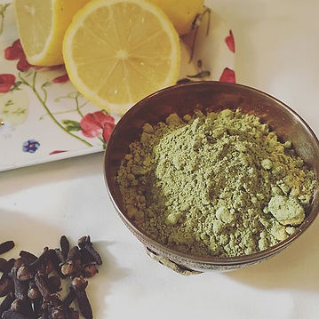 henna powder, fresh leons and cloves