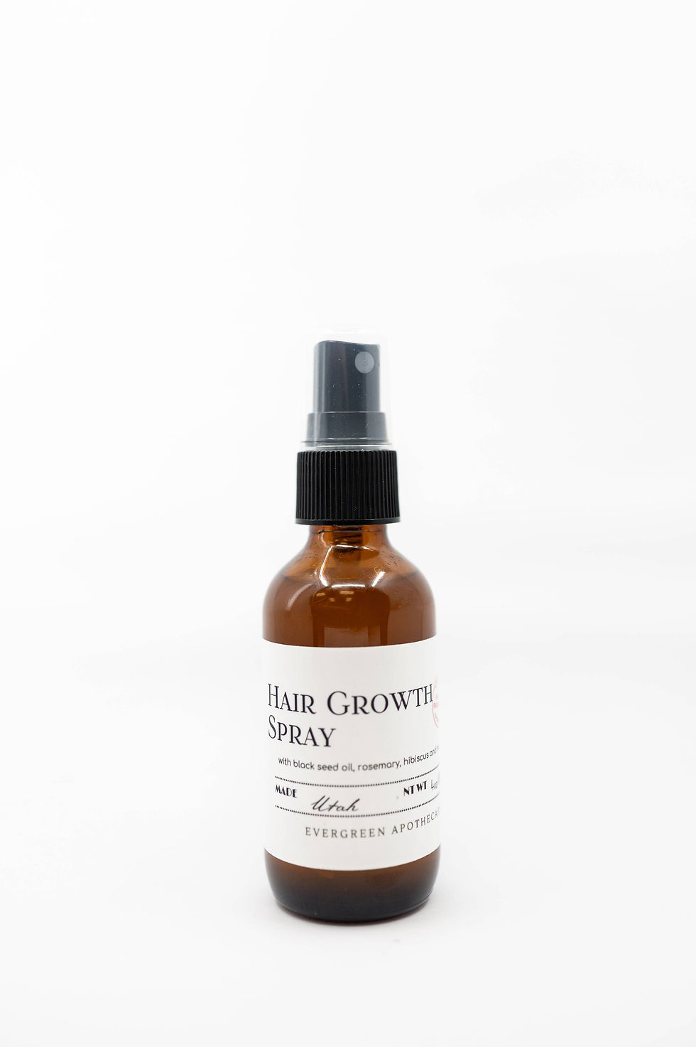 Amber bottle of Hair Growth Spray