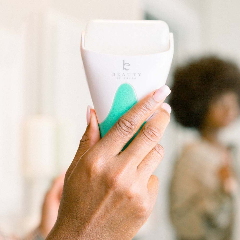 Thumbnail: Woman holding a white and teal beauty tool