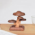 Wooden mushroom sculpture on desk