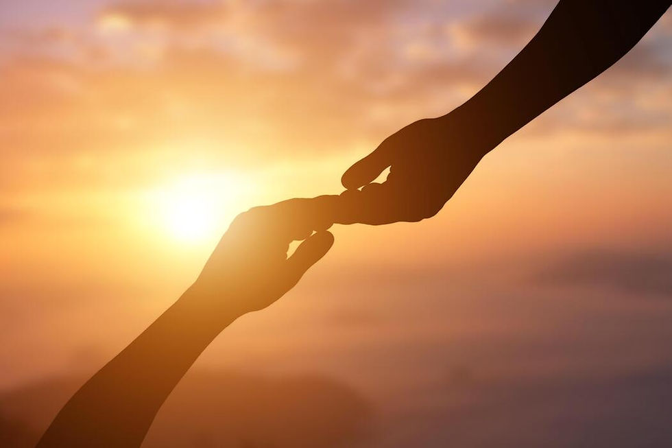 Silhouette of a person lending a helping hand