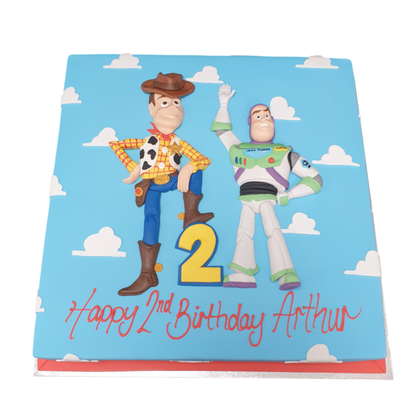 Toy Story themed birthday cake featuring Woody and Buzz characters from the popular animated movie series. Ideal for fans of the beloved franchise.