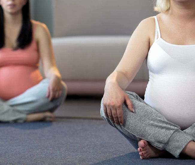 Prenatal yoga class for pregnant women to stay in shape and tone their muscles.jpg