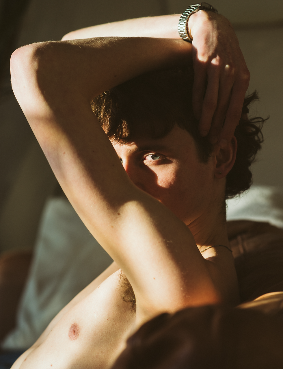 Cinematic profile portrait of Cas in golden hour light, high grain male photography, Nico Quinteros PH.