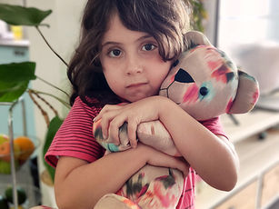 בובה מבגדיה של חוה בן עמי