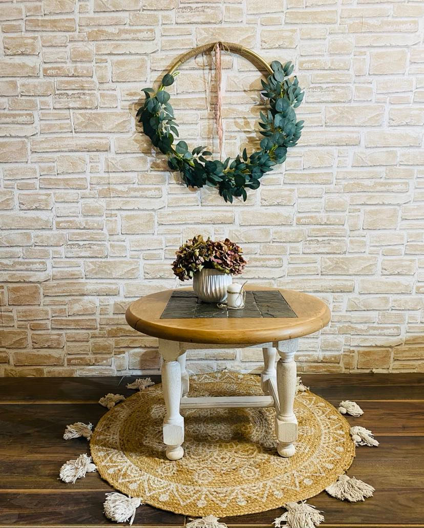 Table basse ronde blanche et bois - a travers le temps