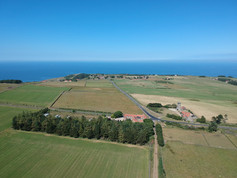 Smugglers Rock House from the air looking towards the sea