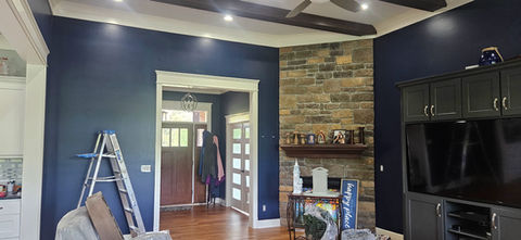 Living room and foyer painted dark blue with low-VOC Sherwin-Williams Duration by Bourbon Country Painting in New Albany, Indiana - alternate angle.