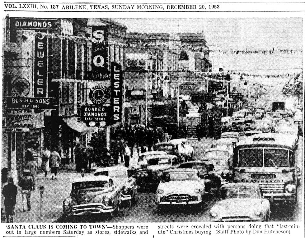 A black-and-white newspaper photo from December 20, 1953, showing bustling downtown Abilene, Texas, during the Christmas shopping season.