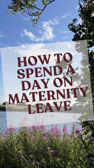 Lakeside scene with purple flowers, trees, and blue sky. Text reads "HOW TO SPEND A DAY ON MATERNITY LEAVE." Tranquil mood.