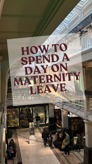 Museum interior with people walking below. Large text overlay reads "How to Spend a Day on Maternity Leave." Bright, bustling atmosphere.