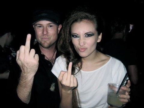 Artist and photographer Sean Murdock and friend flipping off the camera