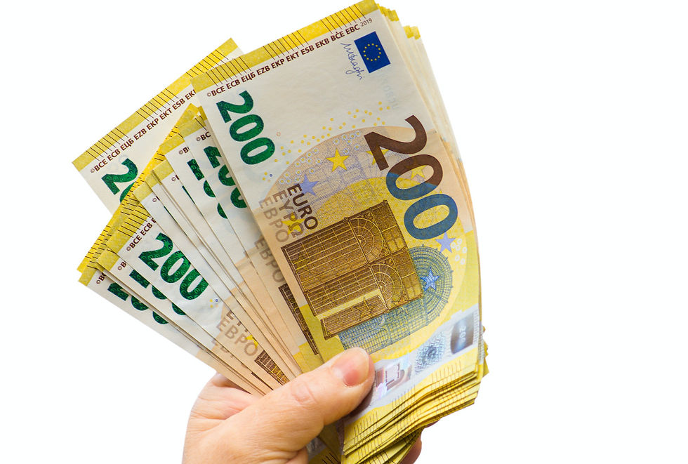 Hand holding 200€ bills