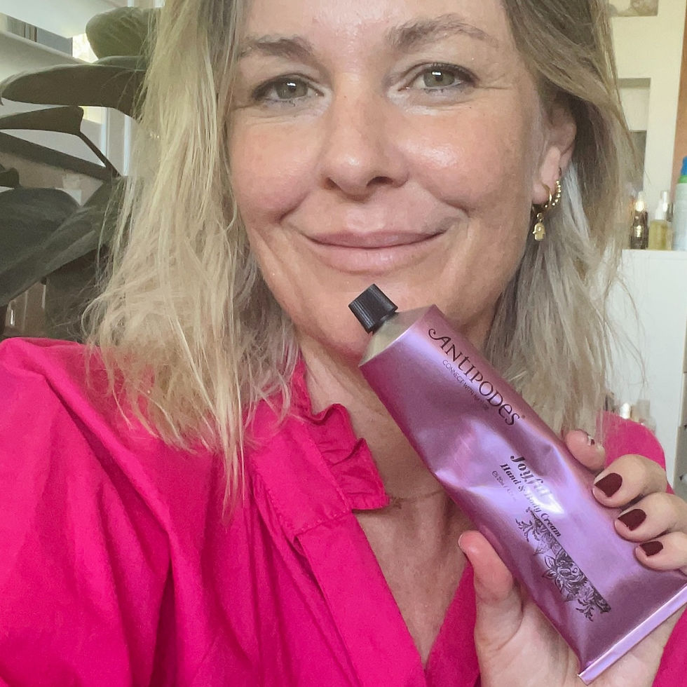 Amanda Ramsay holds  Antipodes Joyful Hand and Body Cream