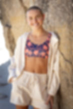 sand button up linen shirt and shorts set on a girl on the beach