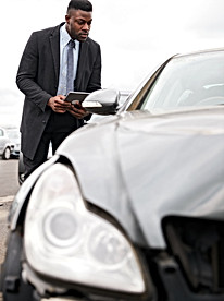 male-insurance-loss-adjuster-with-digita