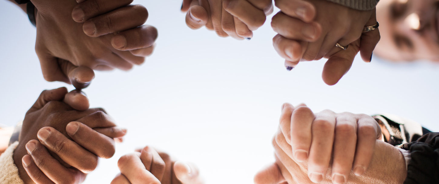 praying-group-hands.jpg