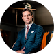 Man in blue suit and tie