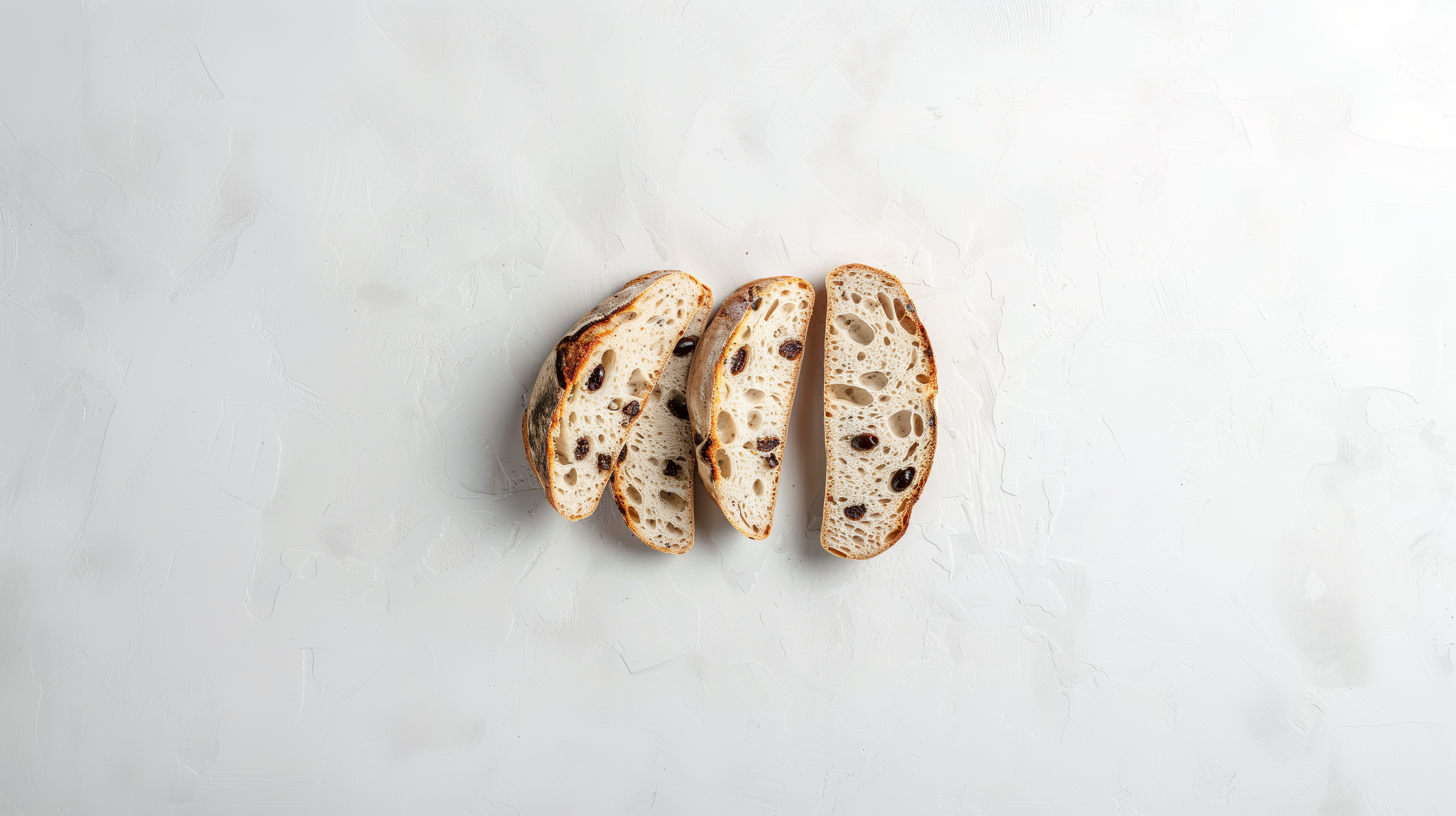 einavr_photoshoot_from_above_of_a_sliced_sourdough_olive_bread__7e167681-647c-4ac8-8860-7e