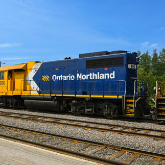 Blue and yellow locomotive train with the words Ontario Northland in white