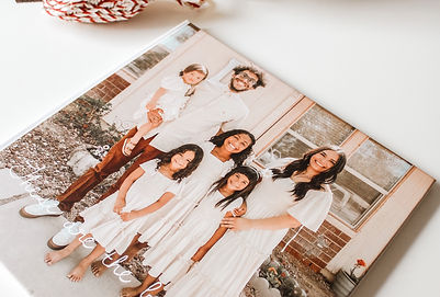 Hardcover family photo book by SimplePrints with a picture of a happy family 