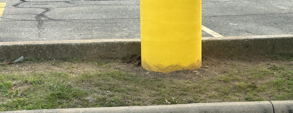 Completed structural repair on light pole in a parking lot