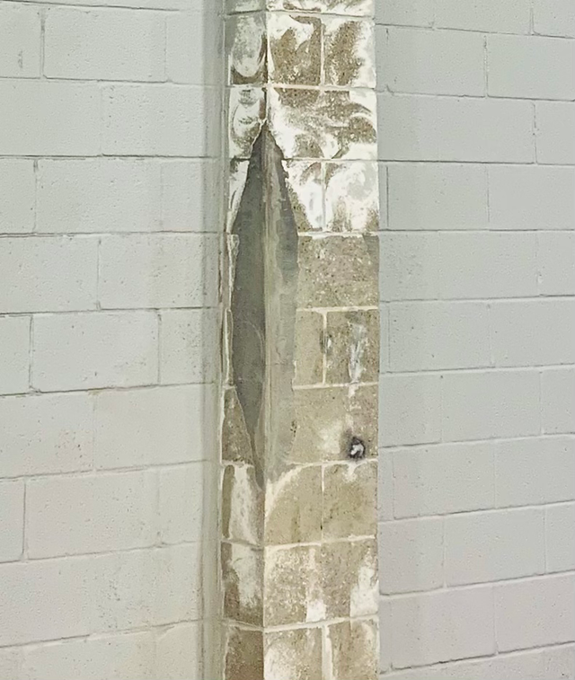 Concrete column after its been patched 
