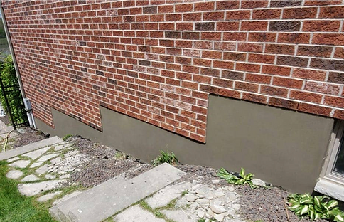 Repaired and coated foundation stem wall