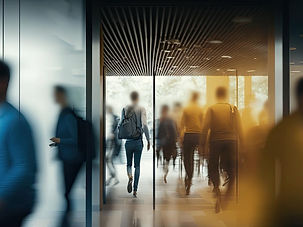 Blurred silhouette of office employees in a blue.jpg
