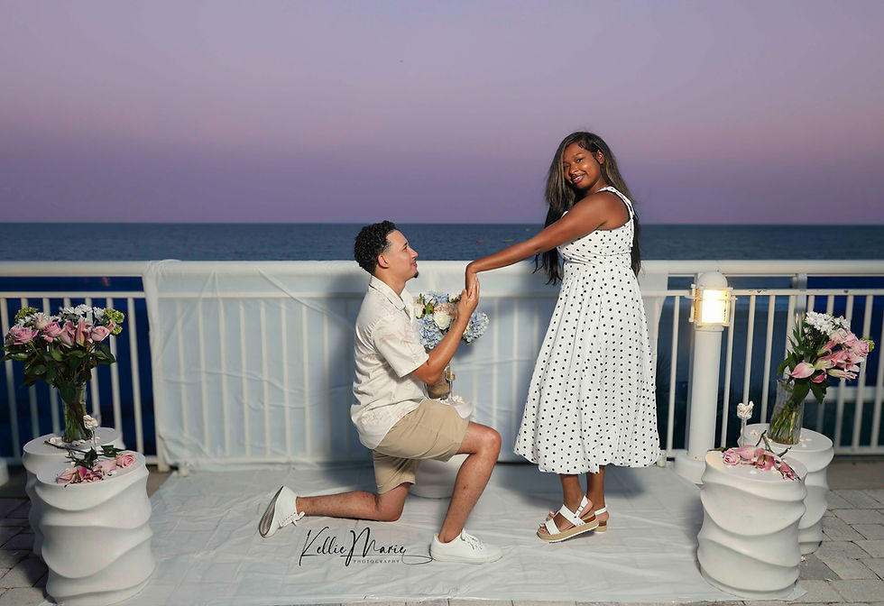Romantic surprise proposal setup with flowers and seashells on the balcony at Crown Reef Resort in Myrtle Beach, South Carolina
