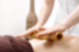 Warm-Bamboo-Massage-Therapy-to-Relax-Back-Muscles.jpg