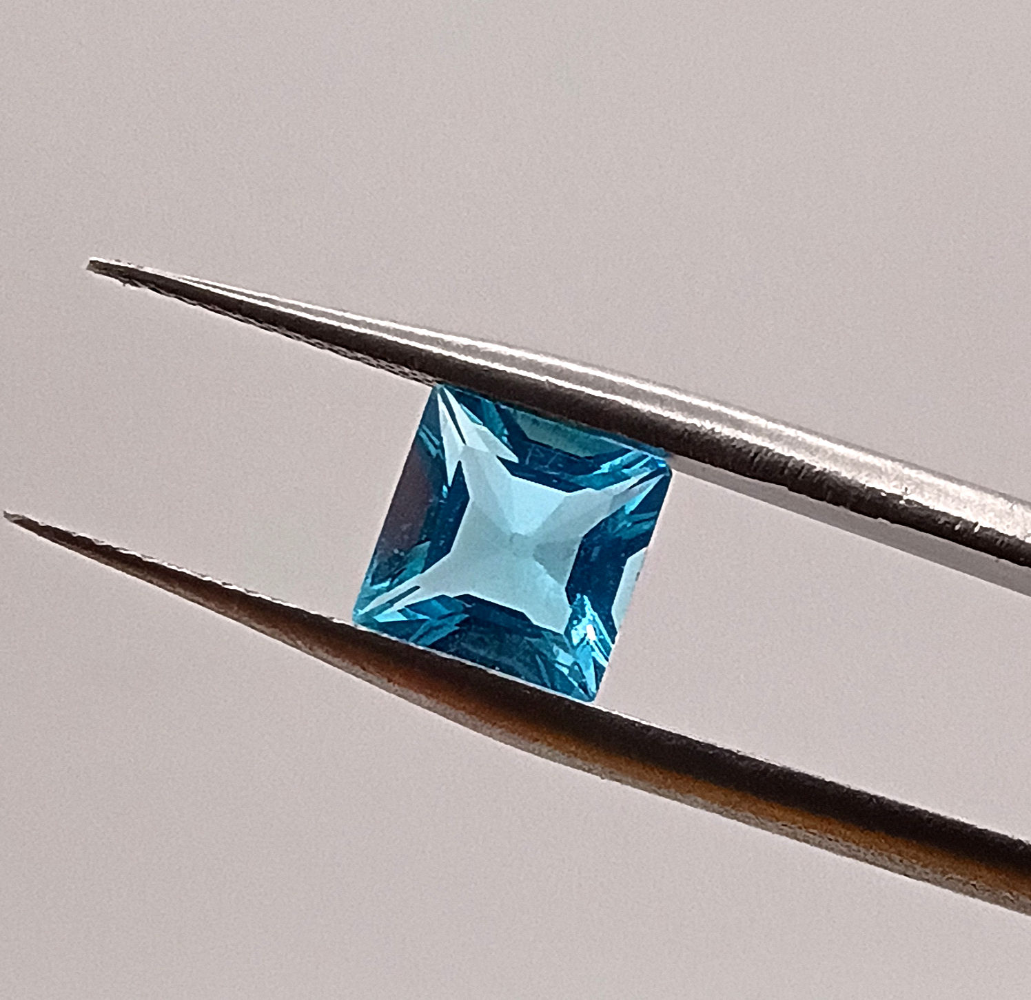#048 Swill Blue Topaz 1.78 Carat- Princess Cut