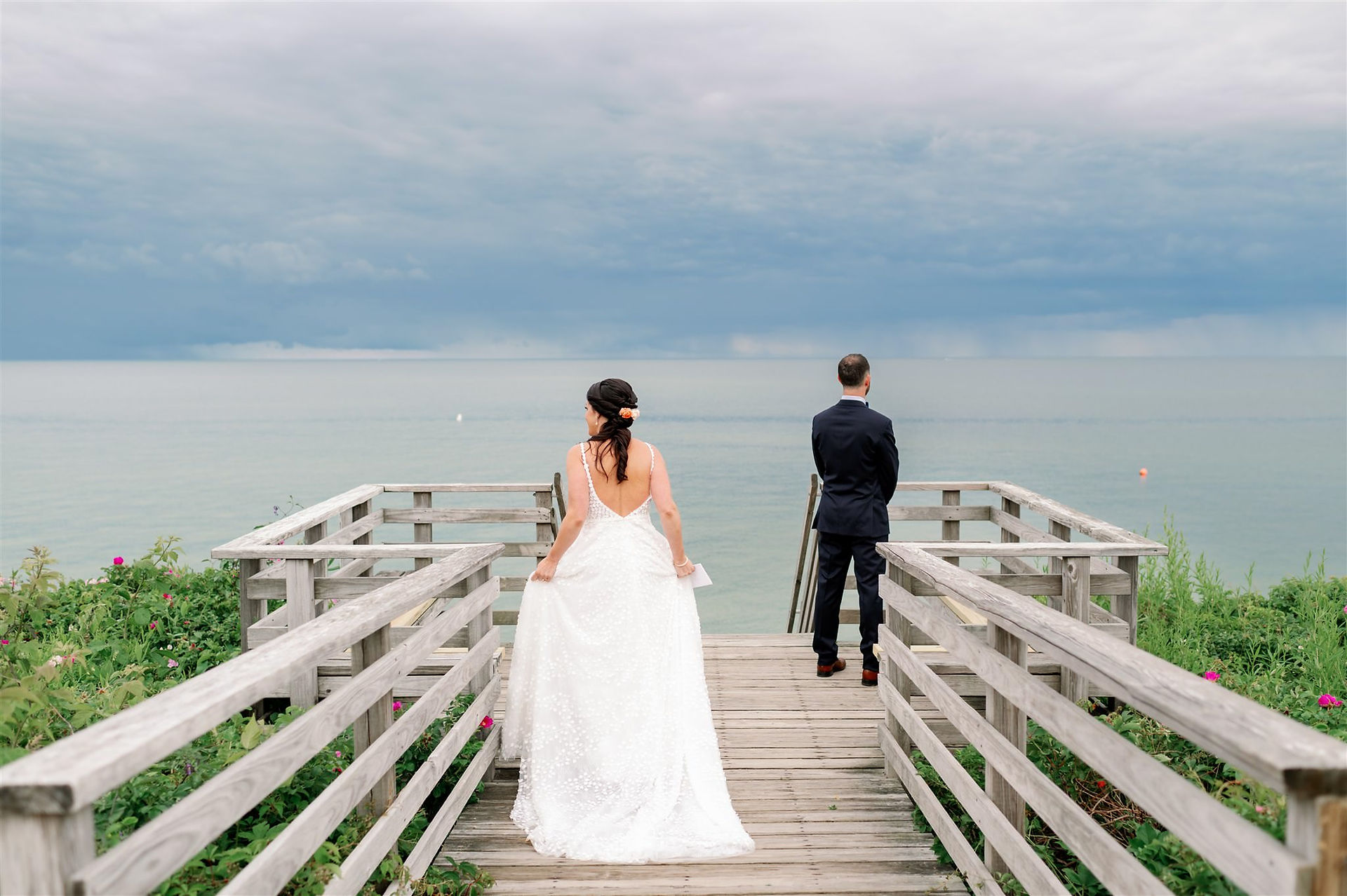 Bride approaching groom for first look at Cape Cod