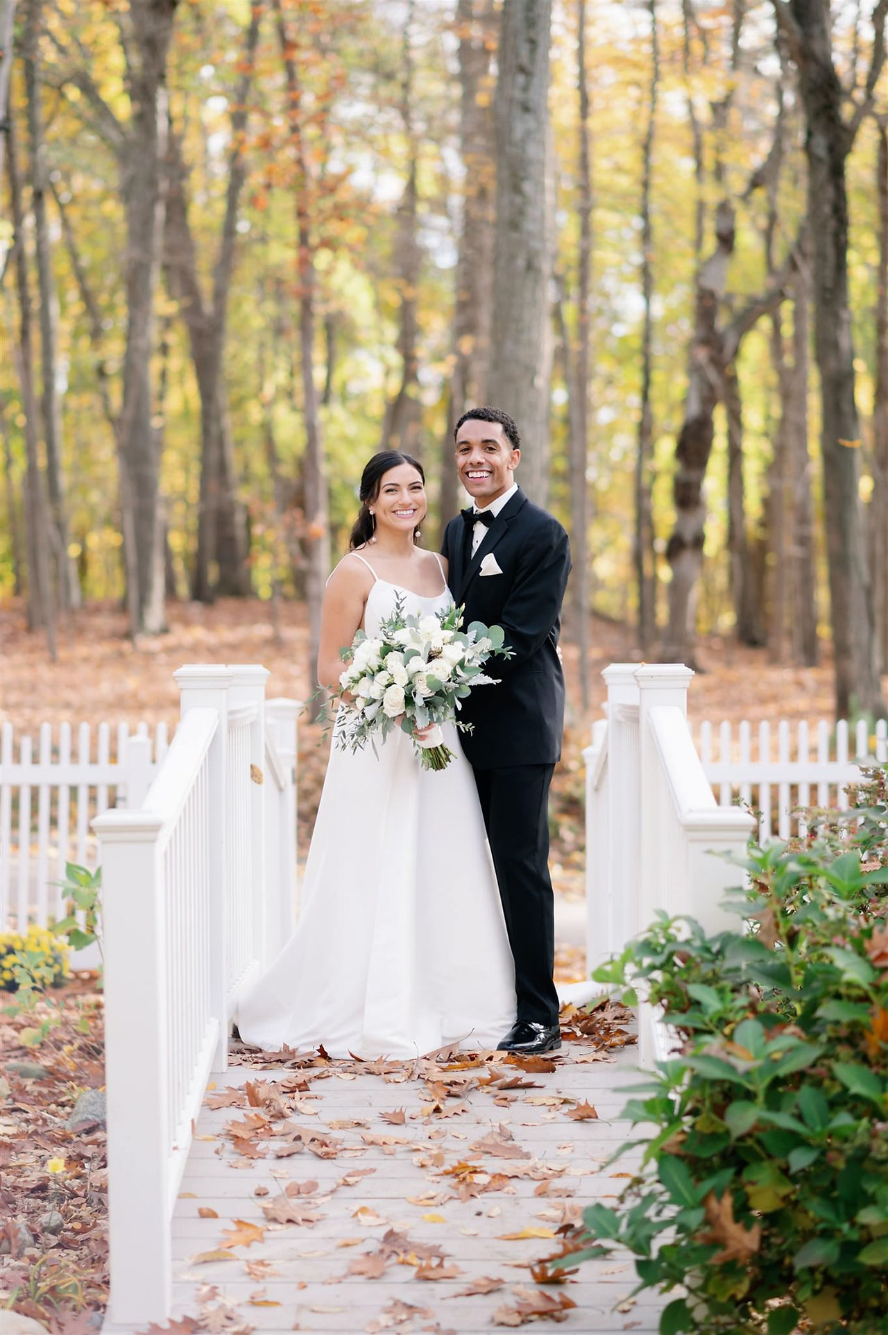 wedding photos on bridge in garden at saphire estate