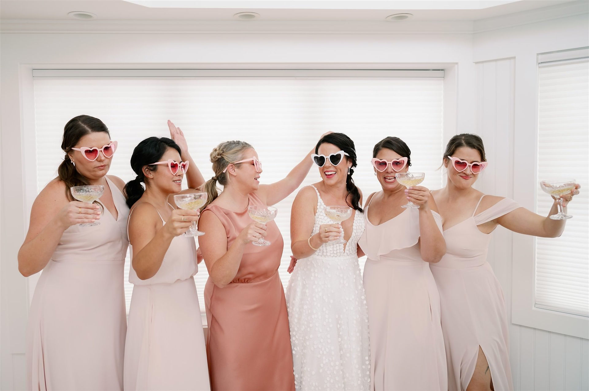 Bridesmaids in heart sunglasses