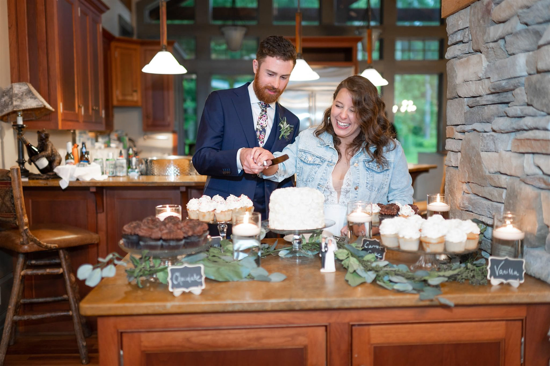Bride and groom cutting wedding cake