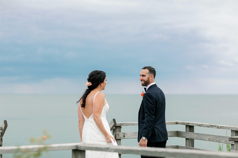 Bride approaching groom for first look at Cape Cod