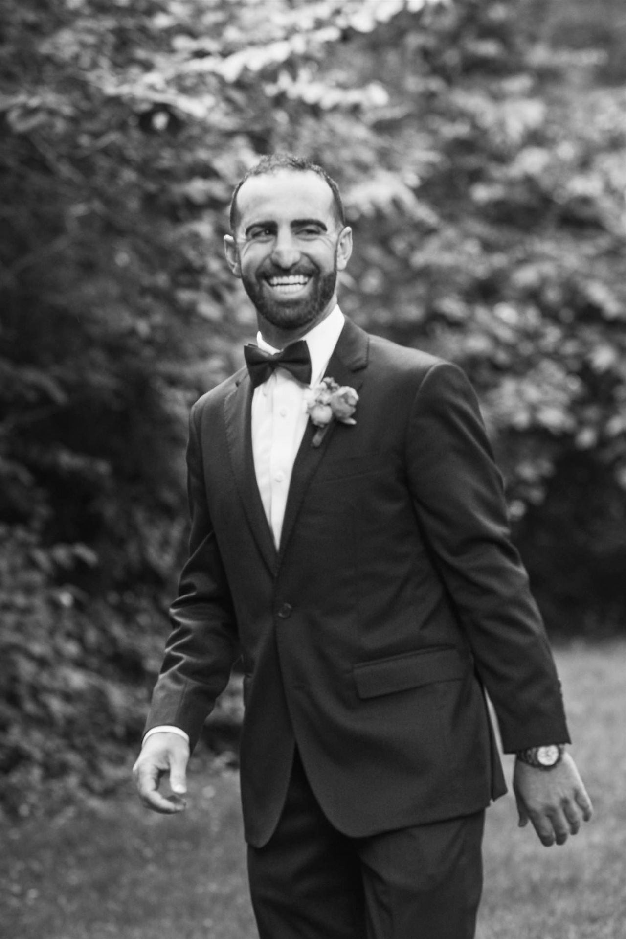 Groom black and white portrait at Wedding at the Popponesset Inn