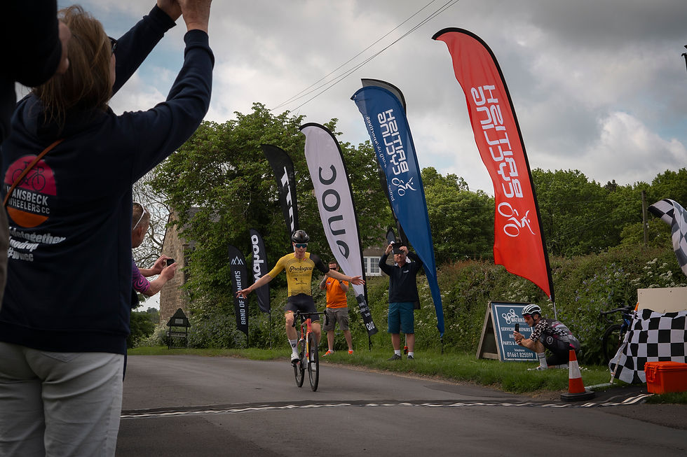 cyclist winning road race celebration