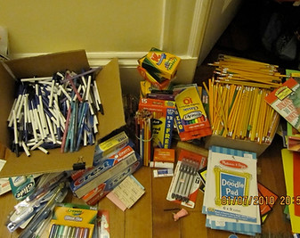 in-kind donations of school supplies to be carried to Uganda