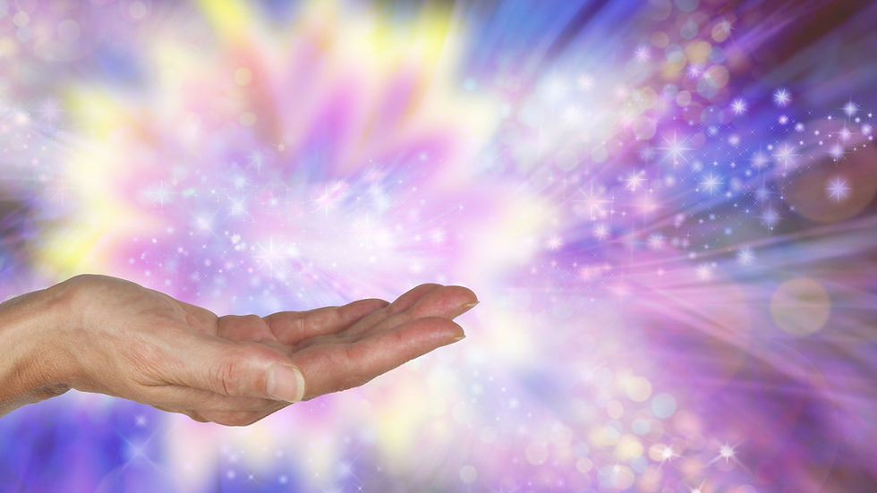 Main dans un rayon de lumière